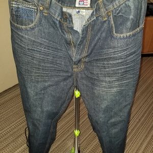 Mens dark denim blue jeans.